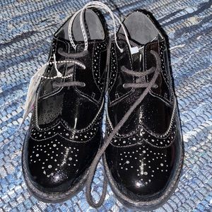 Selling black polo Ralph Lauren dress shoes size 2 boys.